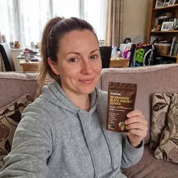 Kelly R. with her PURAVA pouch